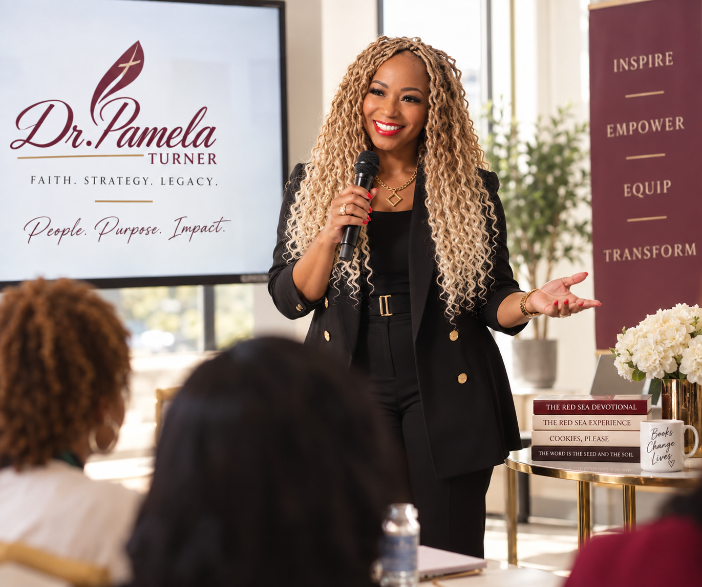Dr. Pamela Turner speaking and teaching before a live audience.